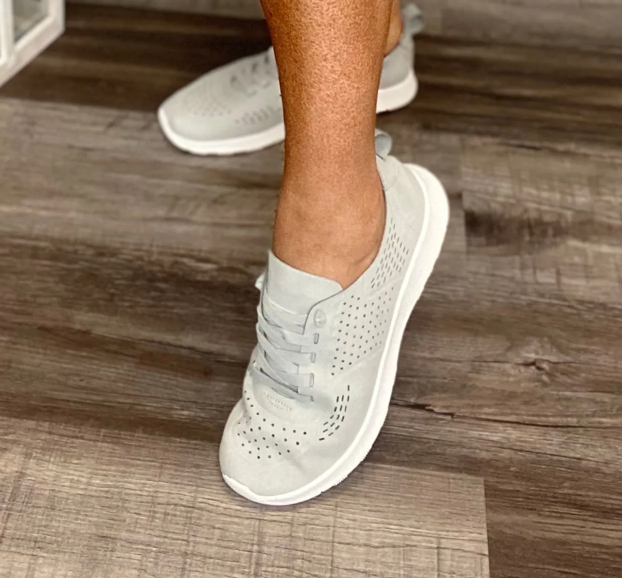 Light grey slip on sneakers